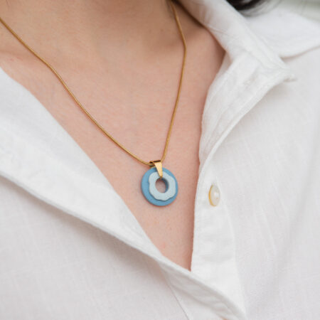 Handmade Jewelry Maleni Atelier Blue round necklace with organic aqua shape with cinnamon