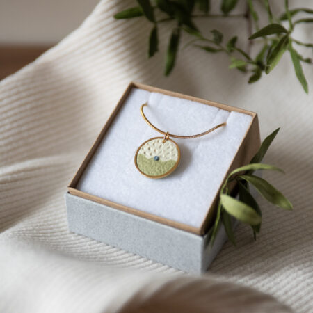 Handmade Jewelry Maleni Atelier Necklace Textured Cinnamon Green Wave with Blue Dot Gold Chain Pendant
